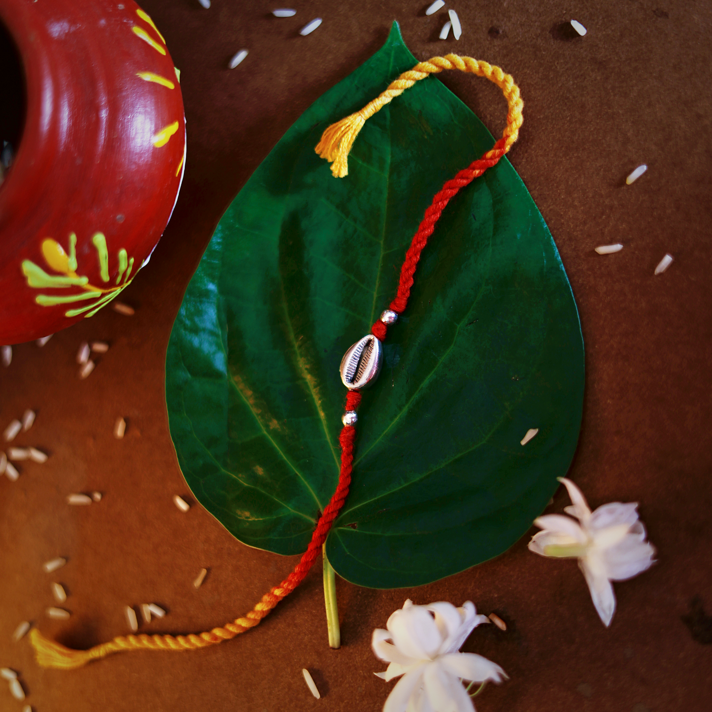 Silver Cowrie Rakhi
