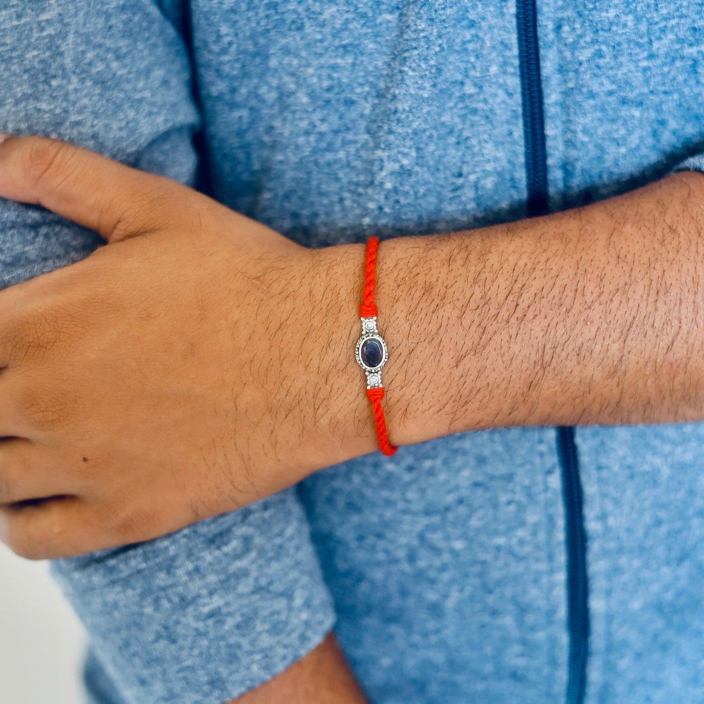 Capricorn Silver Rakhi (December 22 - January 19)- Garnet