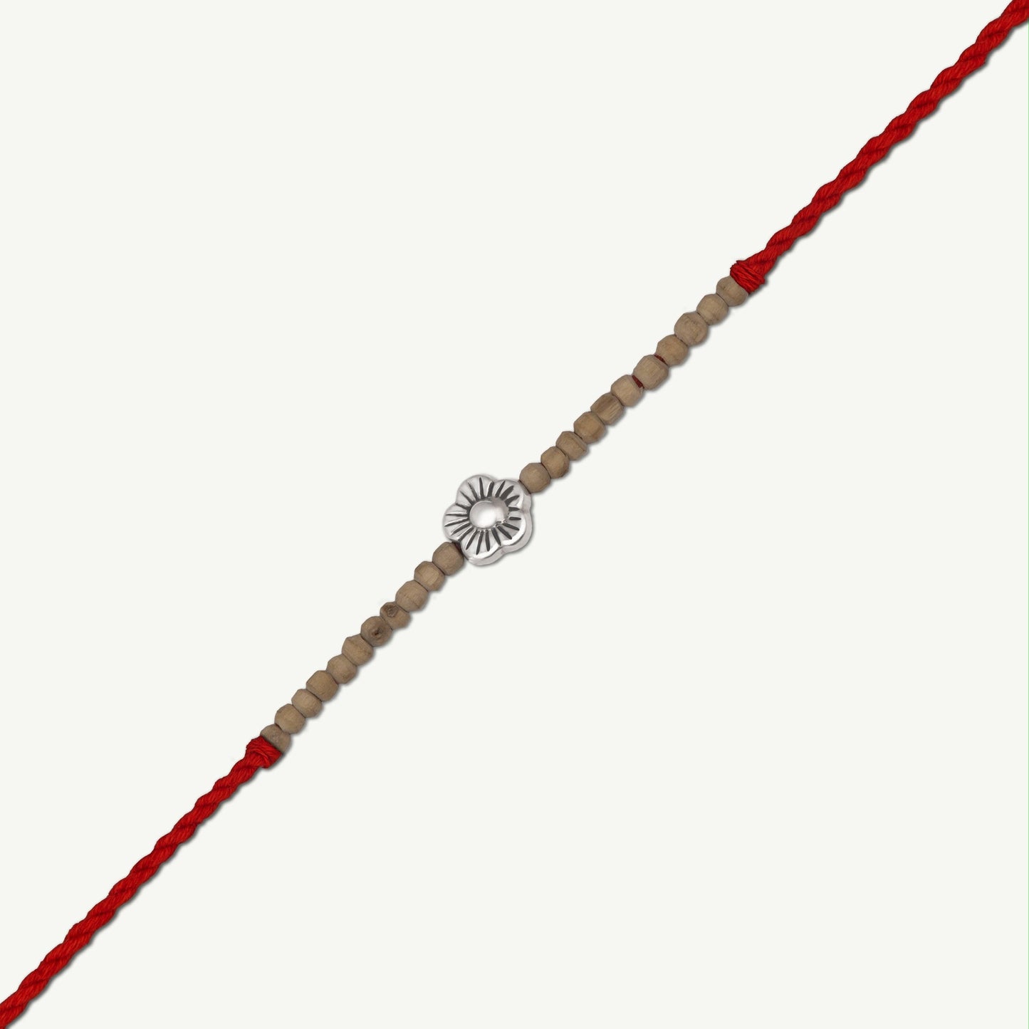 Handcrafted Tulsi Beads and Silver Daisy Rakhi - Smith Jewels