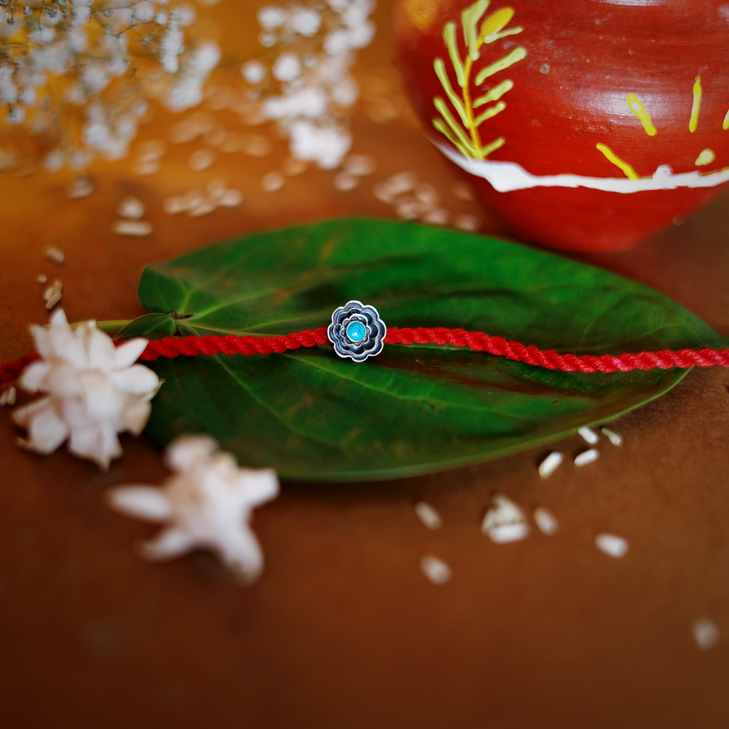 Turquoise Bloom Rakhi