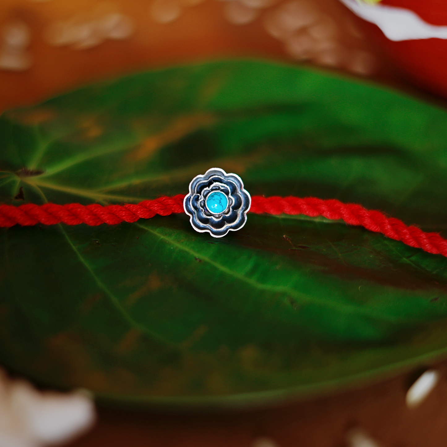 Turquoise Bloom Rakhi