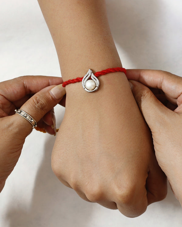 Elegant Pearl Drop Pendant Rakhi