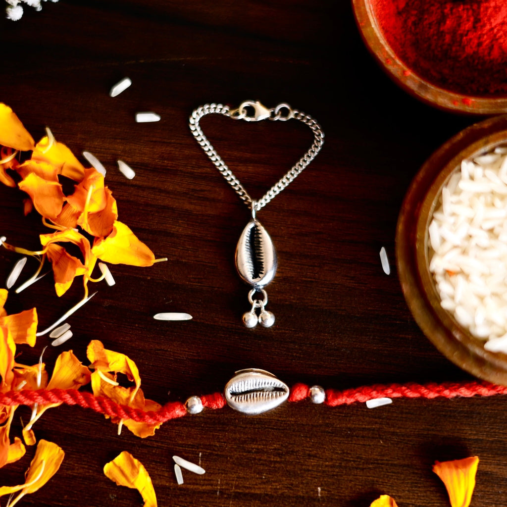Silver Cowrie Lumba Watch Charm Rakhi - Smith JewelsRakhi