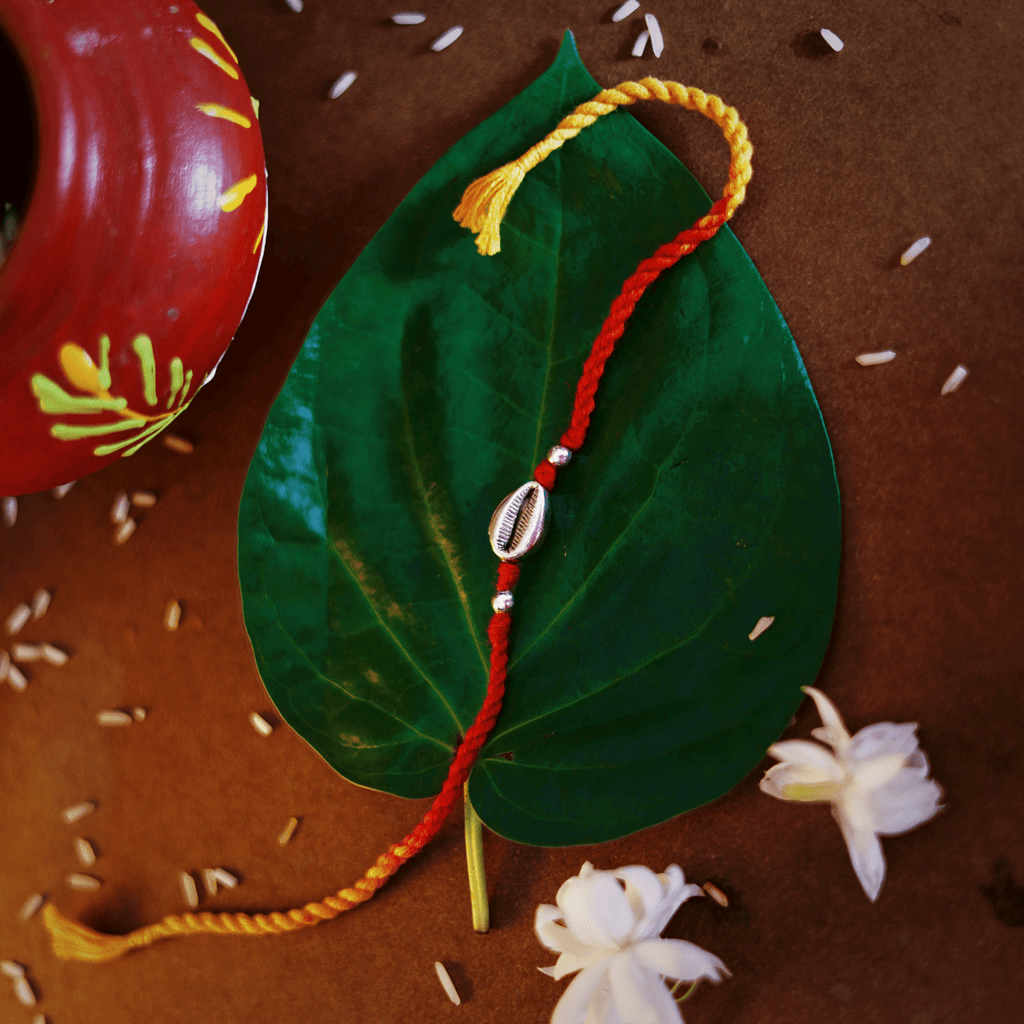 Silver Cowrie Rakhi - Smith JewelsRakhi