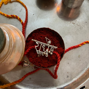 Radhe Rakhi Cum Brooch