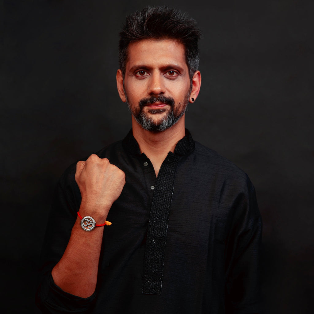 Om Rakhi cum Brooch - Smith JewelsRakhi