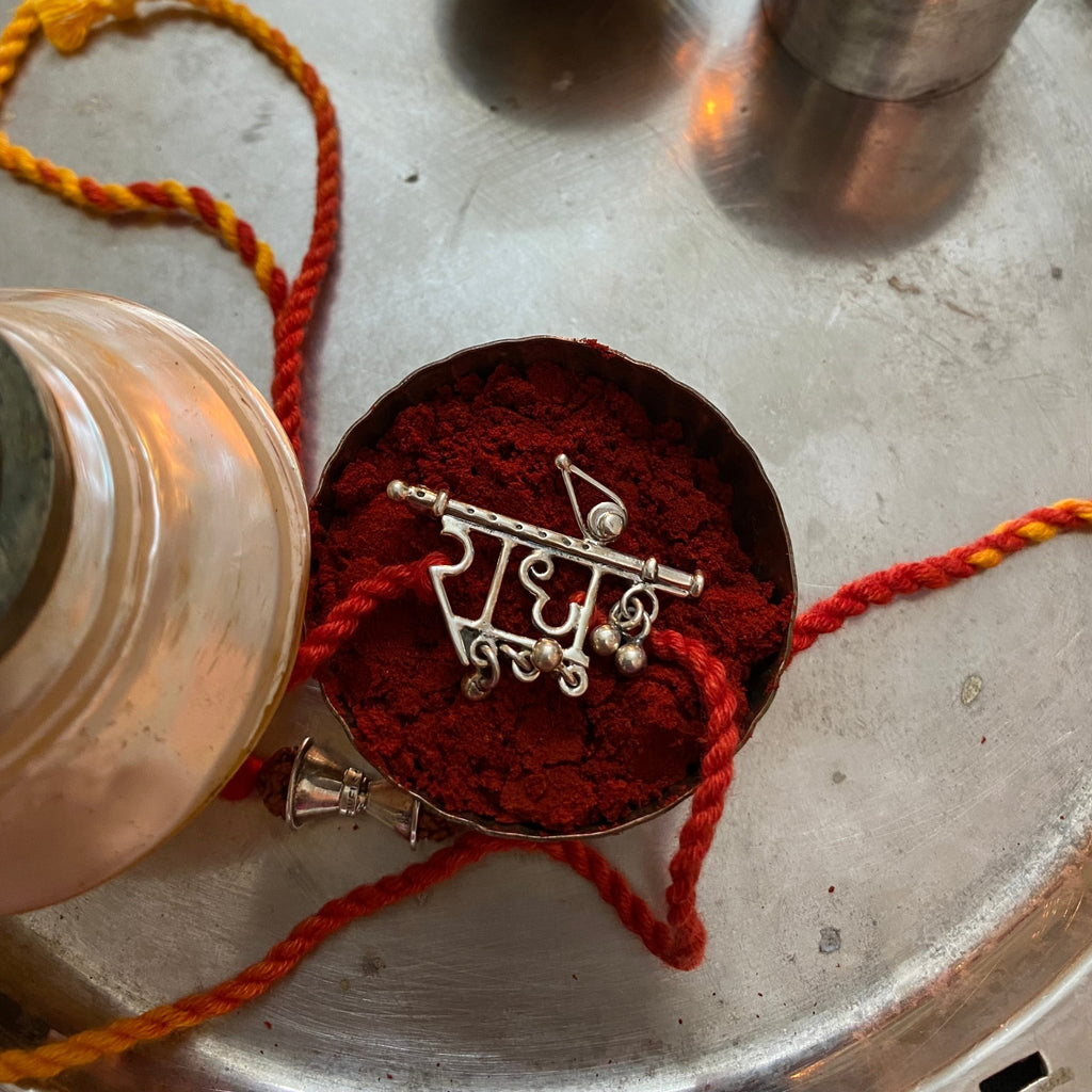 Radhe Rakhi Cum Brooch - Smith JewelsRakhi