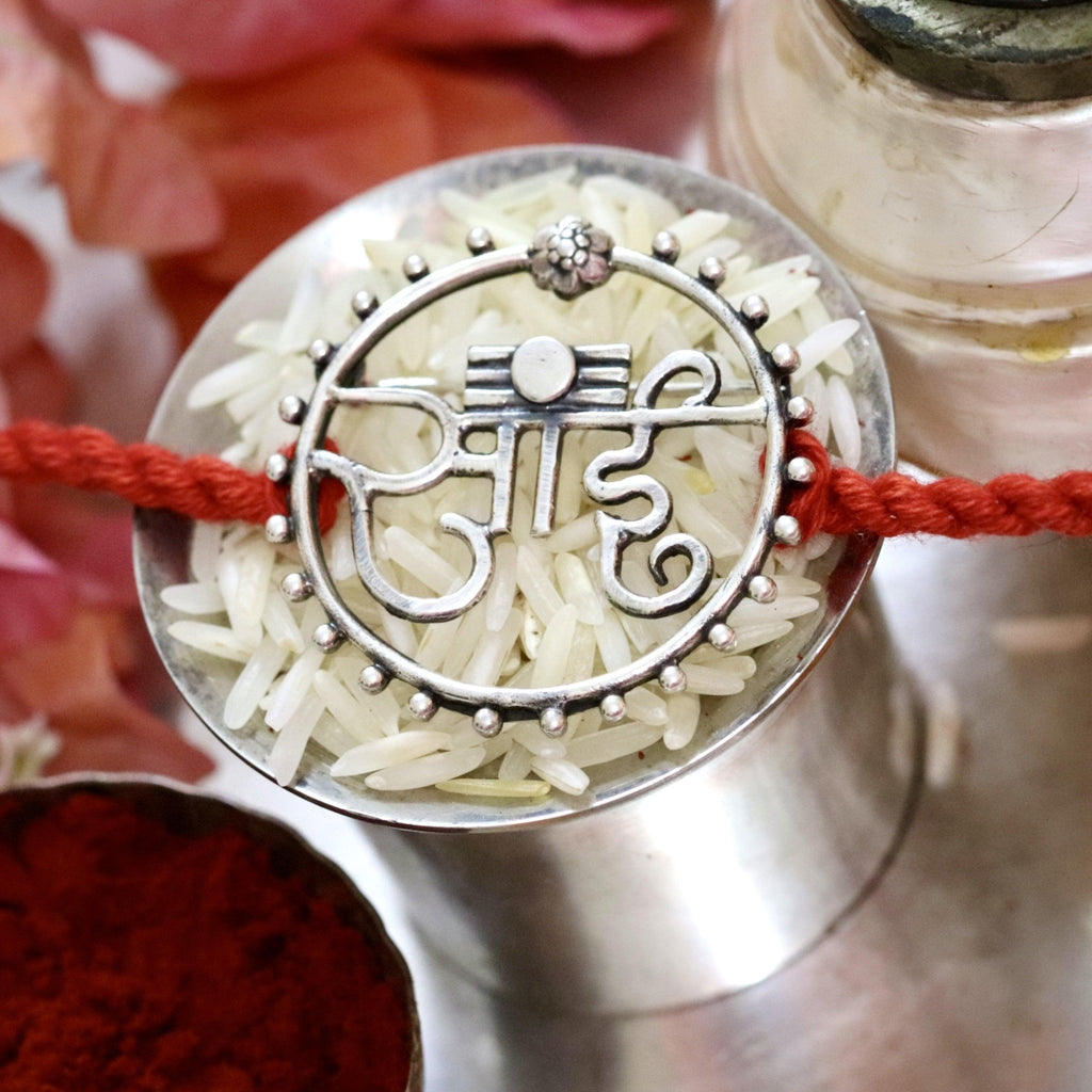 Silver Sai Rakhi cum Brooch - Smith JewelsRakhi